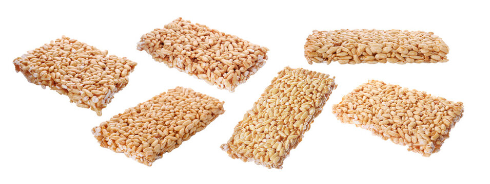 Many puffed rice bars (kozinaki) on white background, banner design