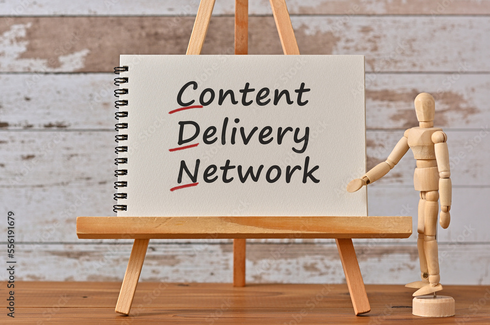 Poster there is notebook with the word content delivery network. it is an eye-catching image.