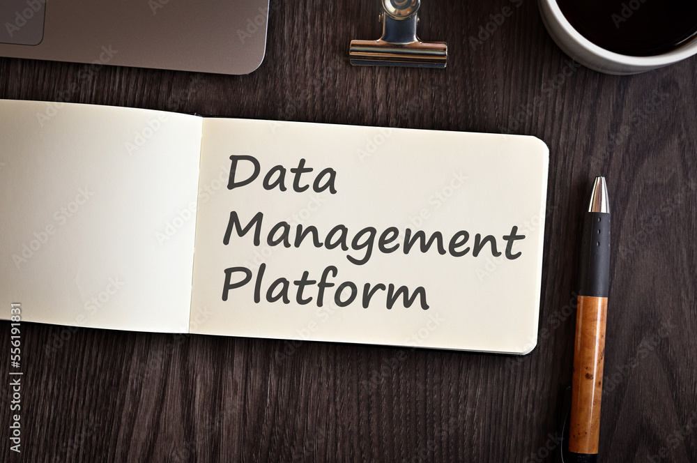 Poster there is notebook with the word data management platform. it is an eye-catching image.
