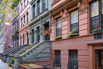 New York townhouses covered in colorful stucco