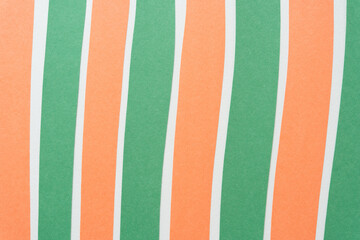 orange and green construction paper background