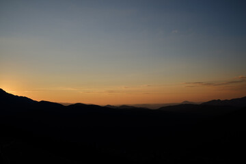 sky mountain sunrise behind the clouds mountain silhouette