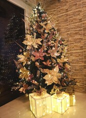 christmas tree and gifts. 