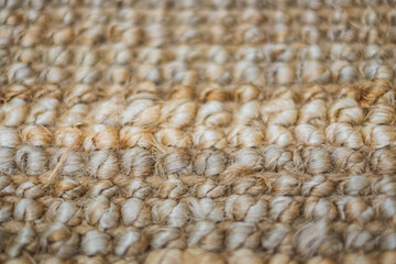 Natural linen texture for the background. Handmade rug made of jute. Jute knitted fabric