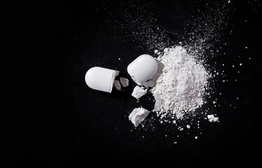 Drugs, pills are cut and scattered on the floor
