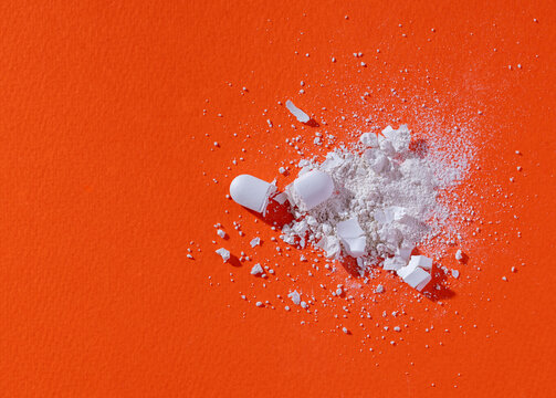Drugs, pills are cut and scattered on the floor