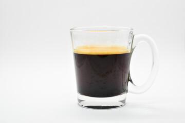 black coffee put on white table background
