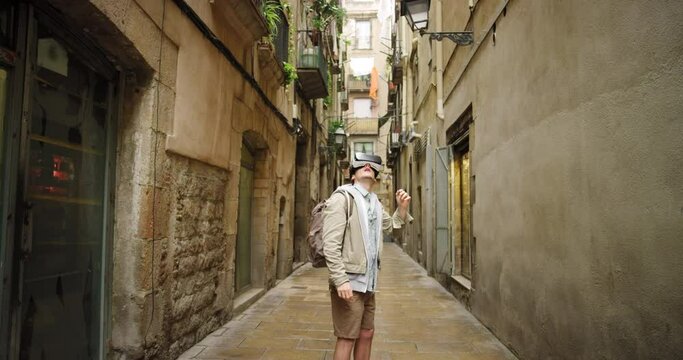 Man, 3d and vr headset, ai and metaverse on travel holiday, barcelona and cyber game in city street outdoor. Male on adventure, virtual reality and connect to multiverse in with digital technology