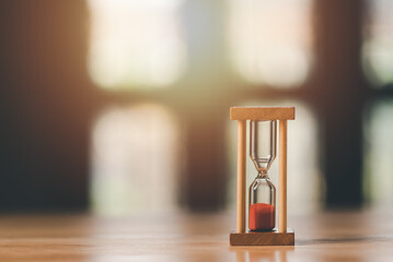 The hourglass is on the table, time management concept,effective business planning,time management...