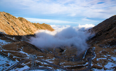 Fog in the valley in the Fagaras mountains on the Transfagarasan road