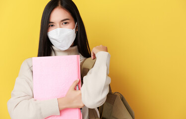 Asian woman Corona virus pandemic, covid-19 education, and back to school concept