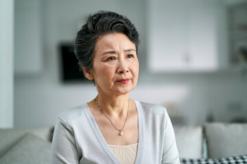 portrait of an unhappy asian elderly woman