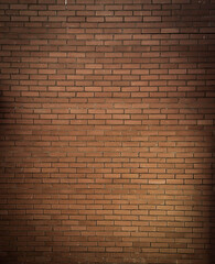 image of a wall made of red brick.