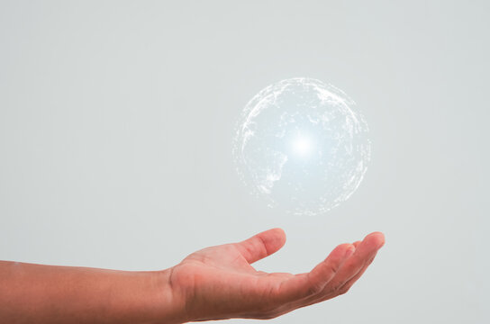 hand holding a Earth globle in technology and communication concept.