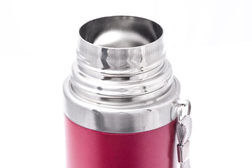 open neck of a red thermos on a white background