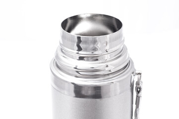 open neck of a gray thermos on a white background