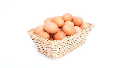 fresh organic chicken eggs. on brown basket,
