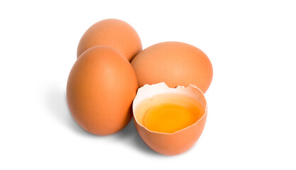 fresh organic chicken eggs and half-broken eggs with yolk isolated on white background
