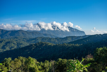 Majestic view of Doi Luang Chiang Dao in northern Thailand, the third highest mountain in Thailand, seen with beautiful dramatic clouds and colorful sky