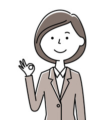 OKサインをするスーツの女性