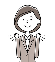 ガッツポーズをするスーツの女性