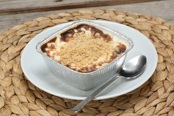rice pudding with milk served with crushed hazelnuts