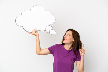 Young caucasian woman isolated on white background holding a thinking speech bubble with surprised expression