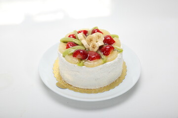 cake with strawberry, banana and kiwi, mix fruit
