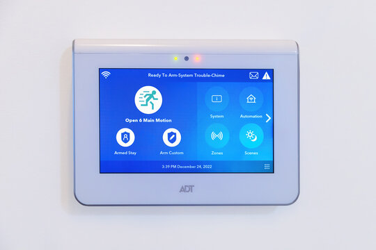 Calgary, Alberta, Canada. Dec 25, 2022. An ADT Home Security Touchscreen Panel. A command center for a smart home.