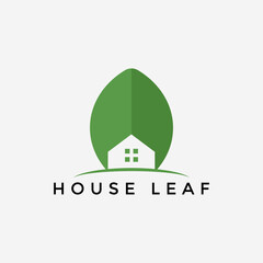 Simple minimalistic vector logo of house and leaf. Eco-friendly home concept.