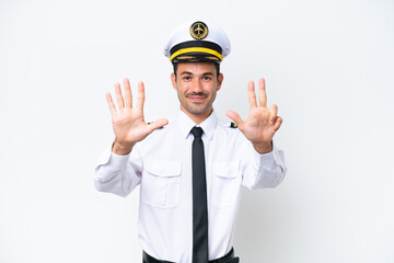 Airplane pilot over isolated white background counting eight with fingers