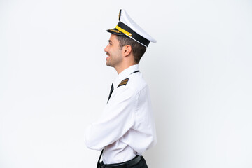 Airplane pilot over isolated white background in lateral position