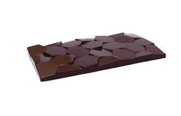 curly bar of dark chocolate on a white background