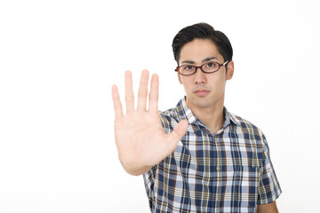 Naklejka premium 止まれのジェスチャーをする男性