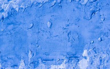 Texture of a blue putty wal.