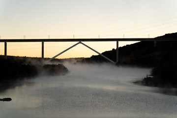 Fototapeta na wymiar Modern bridge for high speed train early in the morning