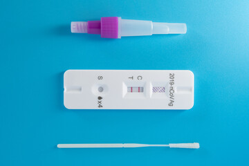 top view antigen tester for coronavirus with result of positive
