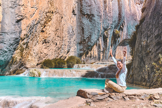 Young woman at viewpoint of the natural pools of Millpu, Ayacucho, Peru. Concept about travel
