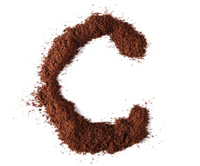 Ground coffee in shape letter C isolated on white, clipping path