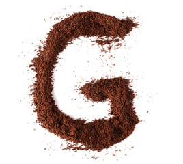Ground coffee in shape letter G isolated on white, clipping path