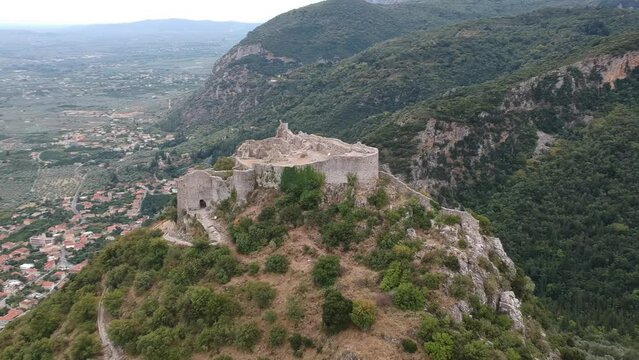 Aerial panoramic view of iconic Byzantine and medieval fortified despotate of Mystras on Mount Taygetus locaten near Sparti town, Laconia, Peloponnese, Greece