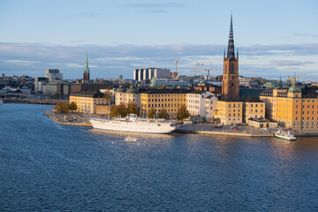 Boat stays at Lake Mälaren near Riddarholmen Church in Stockholm, Sweden