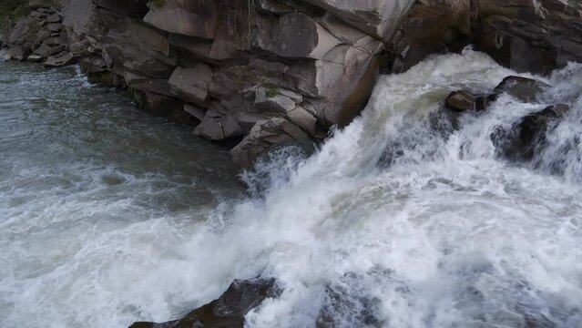 Beautiful and powerful waterfall of Ukrainian Carpathians. Probiy waterfall on Prut River in Yaremche City, western Ukraine