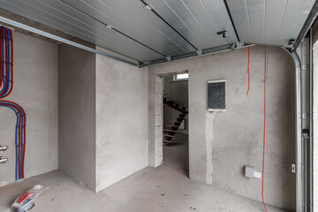 Repairs in the building. Building with a metal staircase at the time of renovation. Construction site in the house without people. Construction of a new house. Construction and architecture