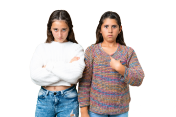 Friends girls over isolated chroma key background annoyed angry in furious gesture