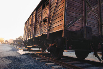 American western train wagon in a gold rush mining town during a haze day