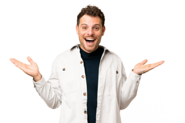 Brazilian man over isolated chroma key background with shocked facial expression