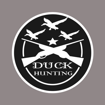 duck hunter logo with duck image and firearm