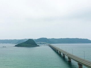 Obraz premium Tsunoshima Ohashi Bridge at cloudy summer day, Shimonoseki, Yamaguchi, Japan