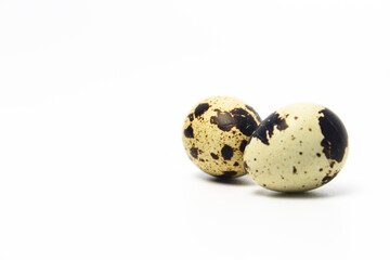 Quail Eggs Kissing Each Other, Pareidolia Effect on Quail eggs. Isolated on White